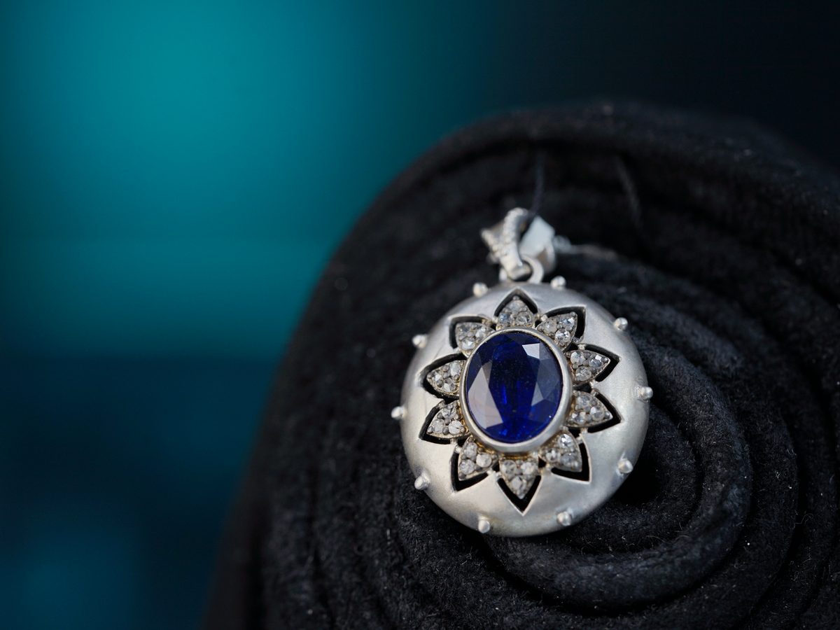 Hand-set sapphire and diamond pendant